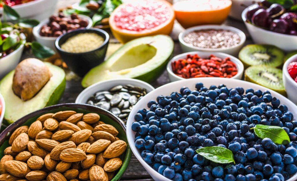 Incorporating a variety of colorful vegetables, berries, nuts, and seeds fosters sustained energy. 